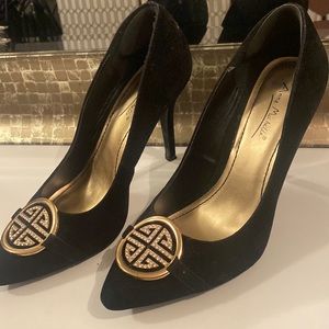 Black suede high heels gold jewelry accents
